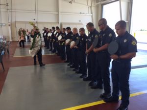 Kahu Kealoha blesses the airport firefighters during the dedication ceremony. 