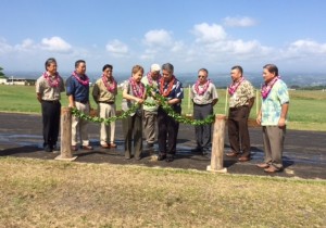 Governor David Y. Ige, state officials and dignitaries gather to untie the maile lei 