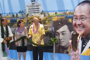 granddaughter of Sen. Daniel K. Inouye, placed her hand with blessed Hawaiian water on to her grandfather’s face during the blessing ceremony 