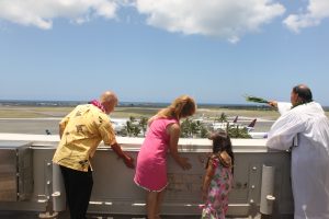 Ken and Jessica Inouye and their daughter Maggie helped Kahu Kordell Kekoa bless the new signs that are displayed above the Daniel K. Inouye International Airport District Office Tower.