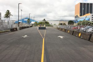 The driveway entrance to Terminal 3 at the Daniel K. Inouye International Airport is located at 3073 Aolele Street between the Delta Cargo and United Cargo facilities.