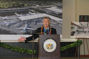 Governor David Ige speaking to the audience during the Mauka Concourse groundbreaking ceremony.