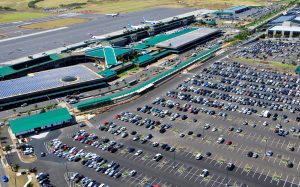 The electric tram route connects the main airport terminal to the Conrac. The solar panels located throughout the airport property help power the tram. Photo Courtesy: Hawaii Department of Transportation or HDOT