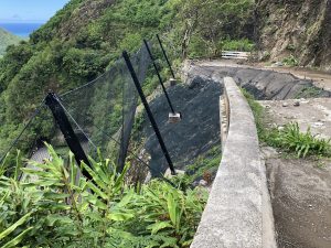 Slope stabilization work includes Tecco mesh netting, 25-30 foot soil nails and an attenuator system between the Old Pali Road and Pali Highway to serve as a catchment for falling material from above. Photo courtesy: HDOT or Hawaii Department of Transportation