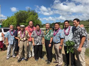 Rep. Sam Kong (left to right); FHWA Assistant Division Administrator Richelle Takara; Sen. Breene Harimoto; Rep. Aaron Ling Johanson; Rep. Ryan Yamane; Governor David Ige; HDOT Director Jade Butay; HDOT Highways Division Deputy Director Ed Sniffen; and Kiewit Infrastructure Manager Manager Jon Samole celebrate the completion of the improvements on the H-1 Freeway.