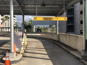 The vehicle height limit to enter the Terminal 1 parking structure is seven feet. This is one of three entrances into the structure that will be replaced with steel bars. Photo courtesy: “HDOT” or “Hawaii Department of Transportation”