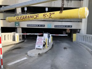 The current PVC pipe clearance warning will be replaced with steel bars. The height limit to enter the Terminal 2 structure is 6 feet 2 inches. Photo courtesy: “HDOT” or “Hawaii Department of Transportation”