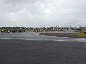 Students participating in runway evacuation drills in 2017. Photo courtesy: “HDOT” or “Hawaii Department of Transportation”