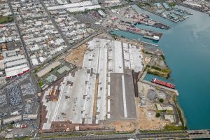 Aerial photograph of the Kapalama Container Terminal project area at Honolulu Harbor. Photo courtesy: “HDOT” or “Hawaii Department of Transportation”