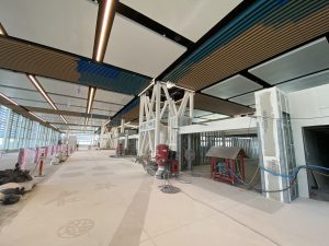 Construction on the holdrooms is well underway where passengers will enjoy ample seating and have the opportunity to visit restaurants and retail shops. Photo Courtesy: Hawaii DOT